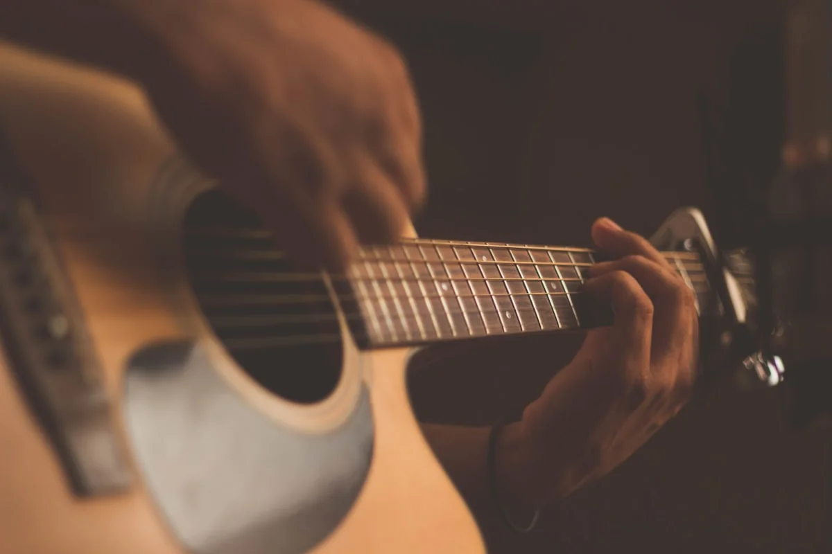 Playing guitar
